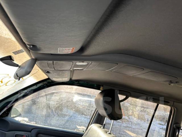 Консоль потолочная для автомобиля марки Mitsubishi