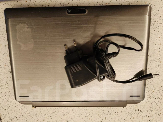 ������-������� Acer Switch One. 10.1", 1,4����, ��� 2048 ��, ���� 32���, WiFi: 1, Bluetooth: 1, ����������� �� 8��. ����