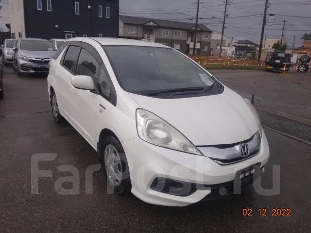 Honda Fit Shuttle. GP2, LDA ����