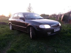 Mazda 323F ����
