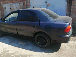 Mazda 323 ����