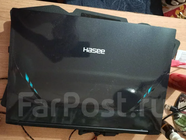 Hasee. 15.6", ��� 16 ��, ���� 512���, WiFi: 1, Bluetooth: 1, ����������� �� 6��. ����