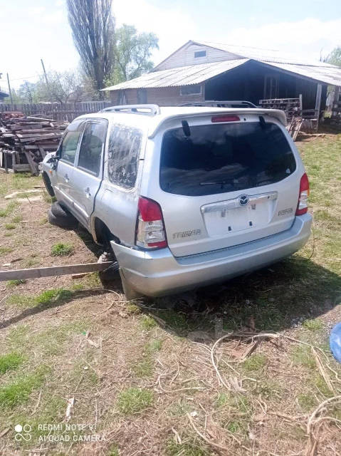 Mazda Tribute. EPEW ����