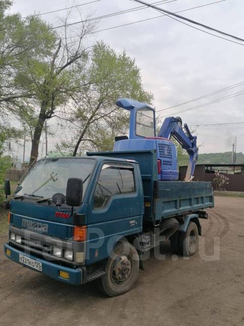 Услуги экскаватора и самосвала в Партизанске