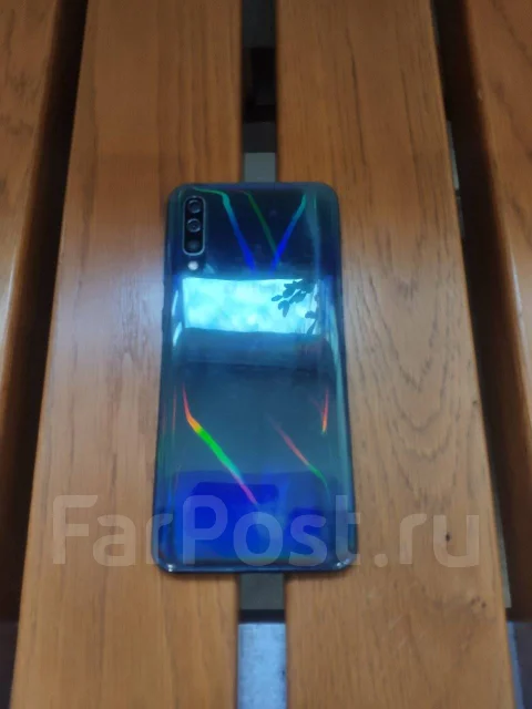 Samsung Galaxy A50. �/�, 64 ��, ������, 3G, 4G LTE, Dual-SIM, NFC ����