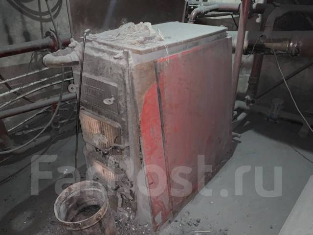 Твердотопливный котел, б/у, в наличии. Цена: 100 000₽ в Находке