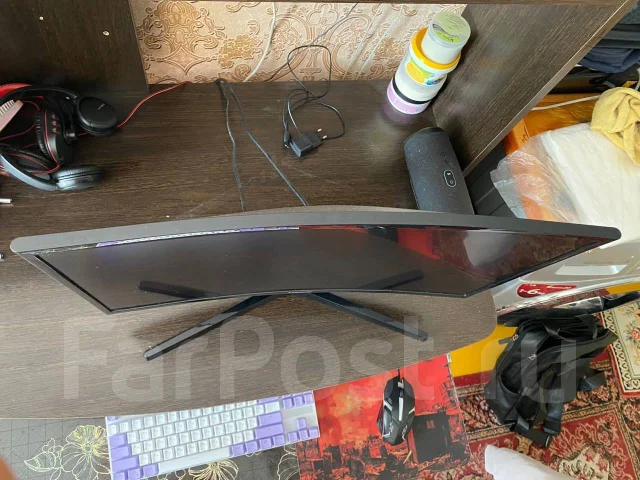 Samsung. 23.5", ���������� OLED ����