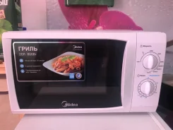 Midea. MG820CFB-W ����