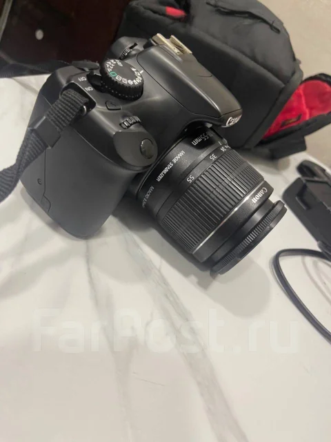 Canon EOS 1000D ����