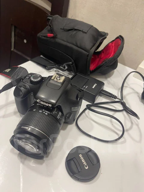 Canon EOS 1000D ����