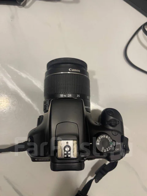 Canon EOS 1000D ����