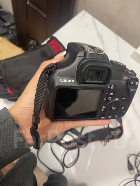 Canon EOS 1000D ����