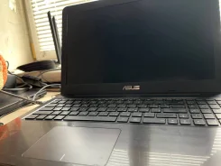Asus VivoBook X556UQ. 15.6", 2,3����, ��� 16 ��, ���� 500���, ����������� �� 3��. ����