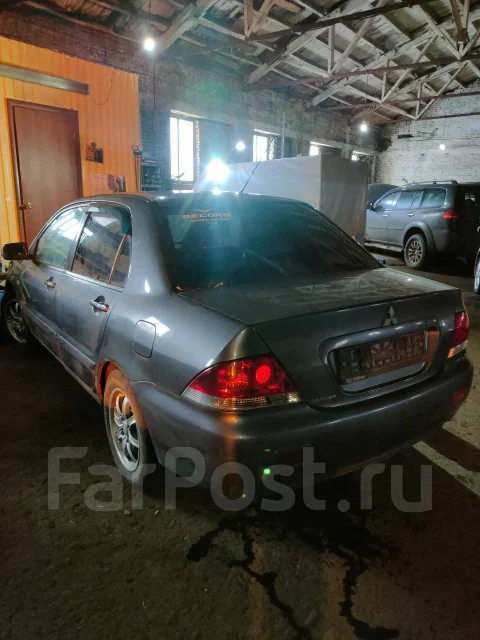 Mitsubishi Lancer. 4G18 ����