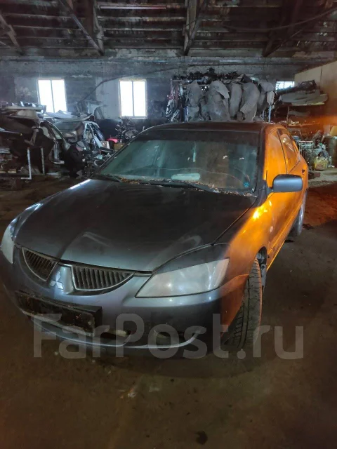 Mitsubishi Lancer. 4G18 ����