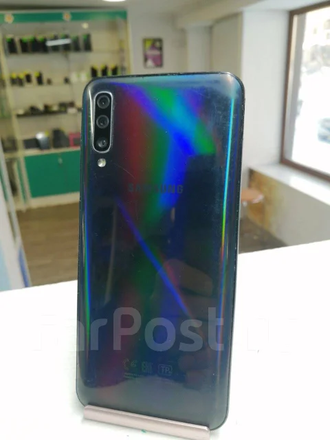 Samsung Galaxy A50. �/�, 3G, 4G LTE, Dual-SIM, NFC ����