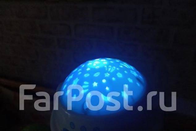  stars projection musical mobile. 