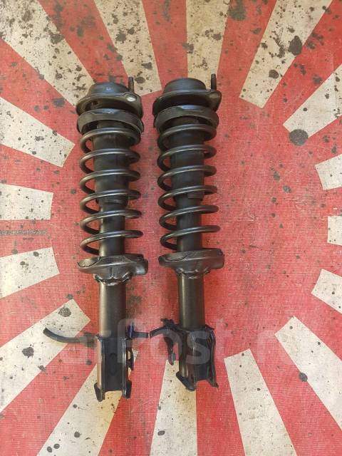 Стойка передняя Mazda Demio DW3W, левая, правая, пара купить в ...