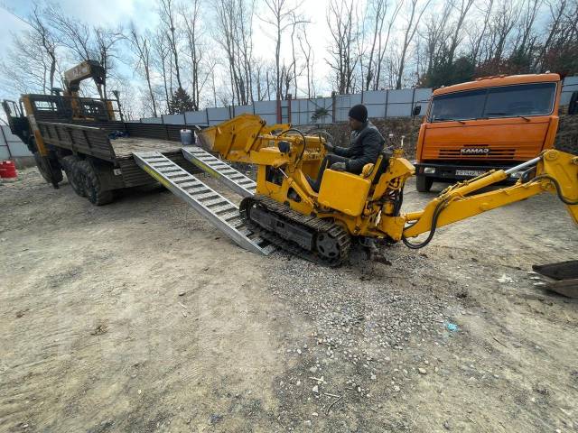 Услуги мини экскаватора-погрузчика-бульдозера. Цена 2000р в час с НДС в ...