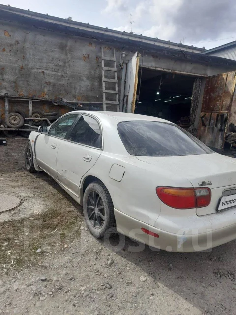 Mazda Millenia. TA, KJ ����