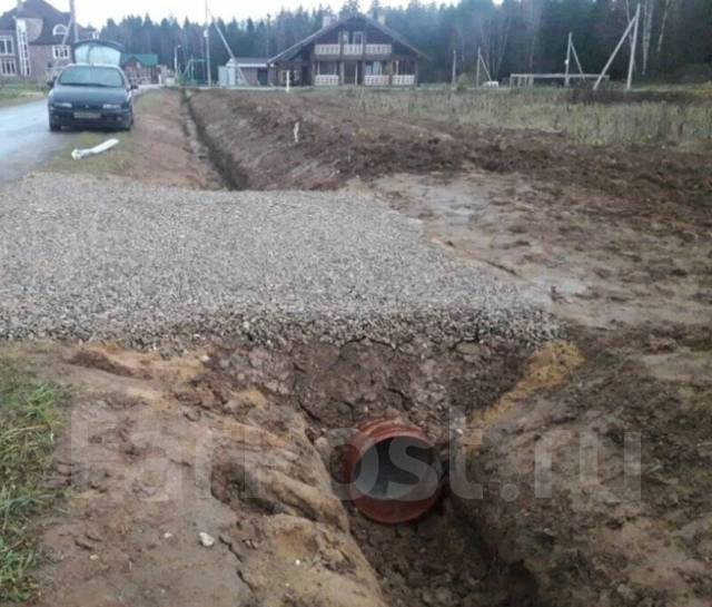 Заезд через канаву на участок. Въезд в гараж в Хабаровске