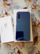 Xiaomi Mi9 SE. �/�, 64 ��, �����, 4G LTE, NFC ����
