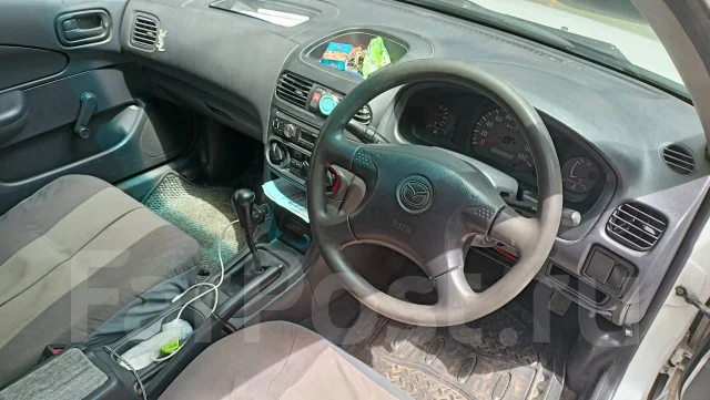 Mazda Familia. ��������, ��������, 1.3 (87��.�.), ������, 310 000����. �� ����