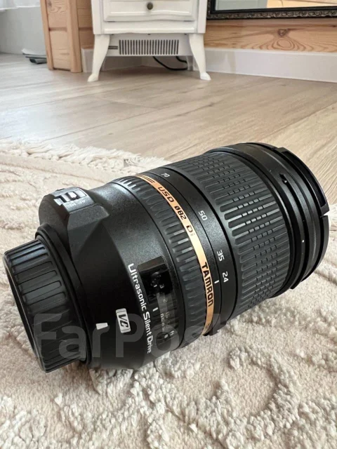 Tamron. ������� ������� 82 �� ����