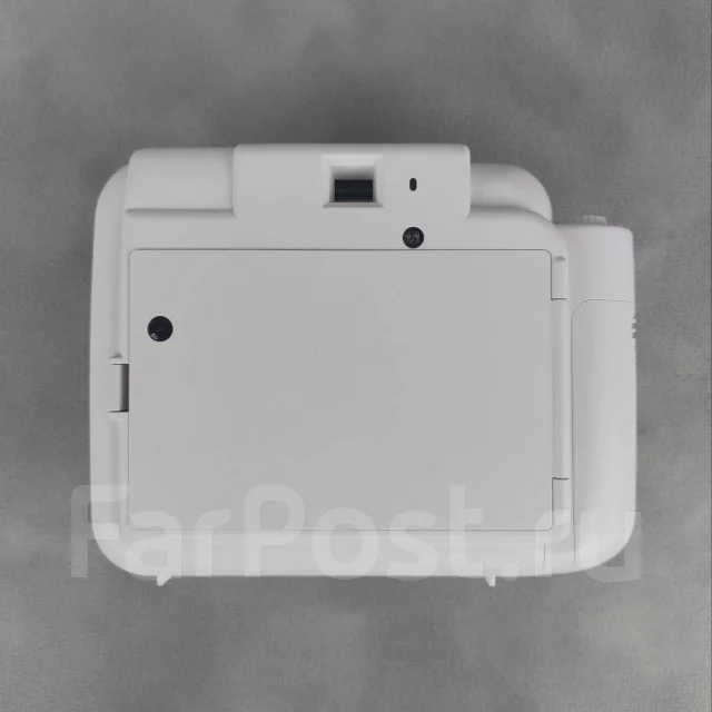 ����������� Popoto Instant Camera Mini Cream White. ��� ����� �� ������� ����
