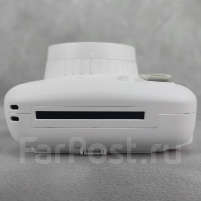 ����������� Popoto Instant Camera Mini Cream White. ��� ����� �� ������� ����