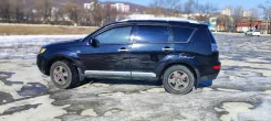 Mitsubishi Outlander. ��������, 4wd, 2.4 (170��.�.), ������, 260 000����. �� ����