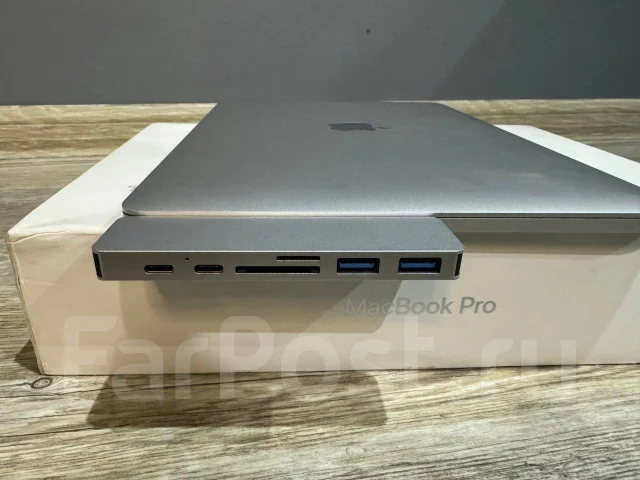 Apple MacBook Pro. 14.1", 2,3����, ��� 8 ��, ���� 128���, WiFi: 1, Bluetooth: 1, ����������� �� 9��. ����