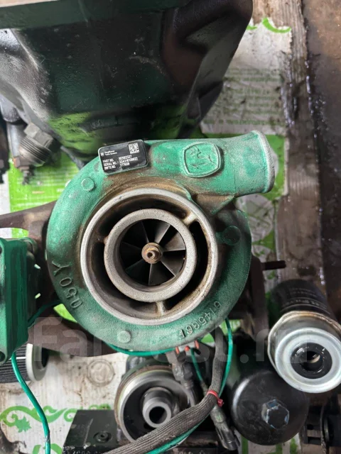 John Deere. 1210d ����