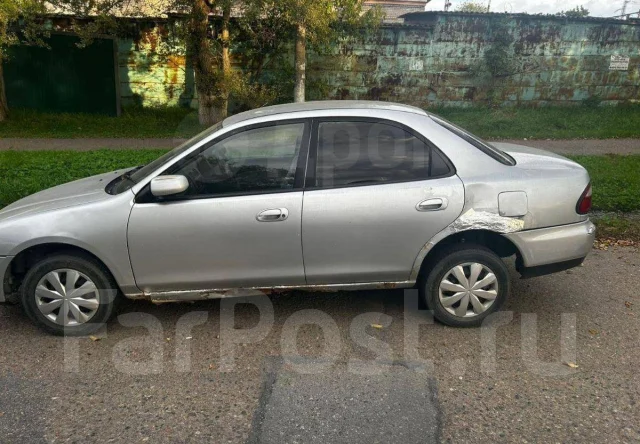 Mazda Familia. �������, ��������, 1.6 (125��.�.), ������ ����