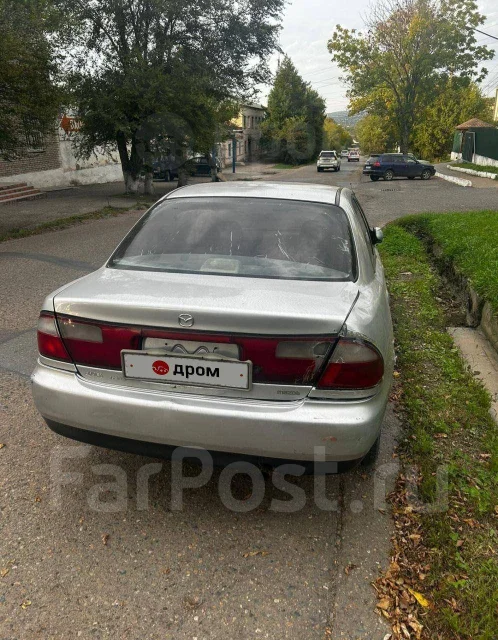 Mazda Familia. �������, ��������, 1.6 (125��.�.), ������ ����