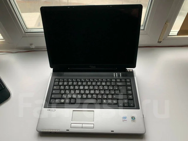 Fujitsu Siemens Amilo. 15.4", 1,8����, ��� 2048 ��, ���� 160���, WiFi: 1 ����