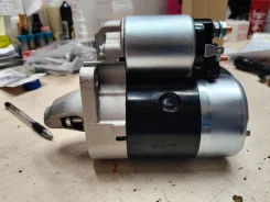 ������� STNI028 23300-AX000 March Cube CR12 CG10 CR14 8T 0.9kw 23300-AX000 ����