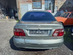 Nissan Almera. N16, QG15 ����