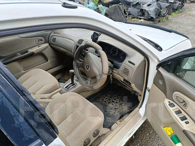 Mazda Familia. BJ5P, ZLDE ����