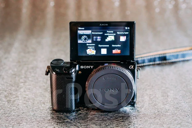 Sony Alpha NEX-5T. 15 - 19.9 �� ����