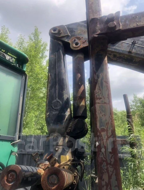 John Deere. 1010 ����