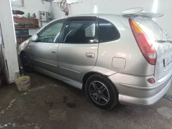 Nissan Tino. HV10, SR20 ����