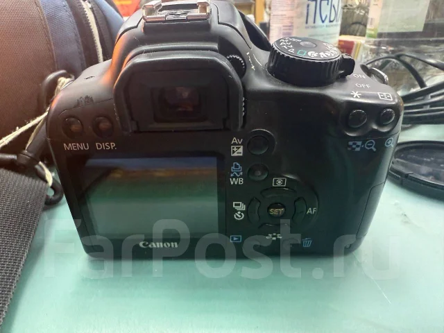 Canon EOS 1000D ����