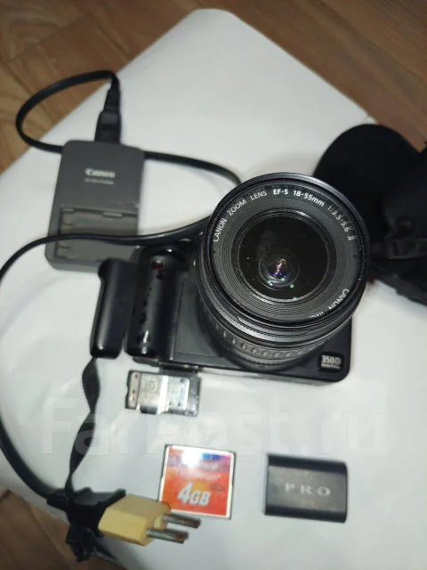 Canon EOS 1000D ����