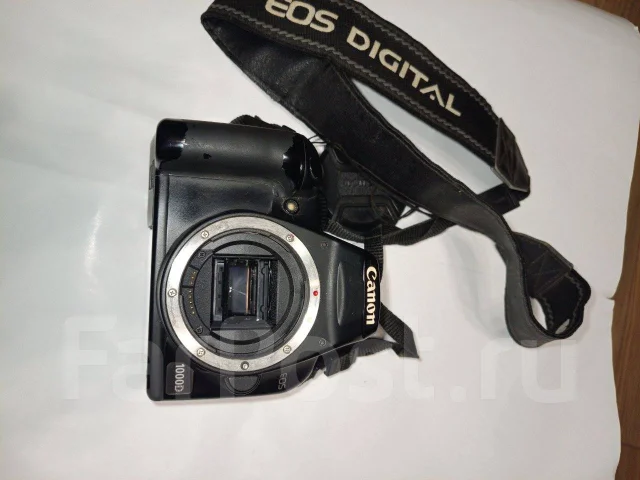 Canon EOS 1000D ����