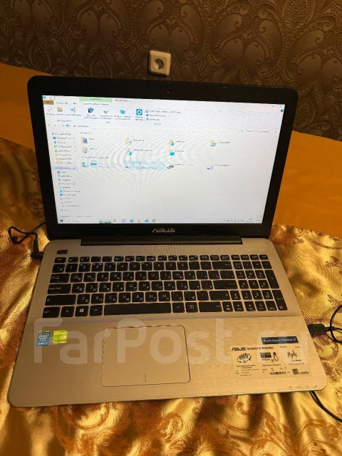 Asus X555L. 15.6", 1,7����, ��� 4 ��, ���� 500���, WiFi: 1, Bluetooth: 1, ����������� �� 1��. ����