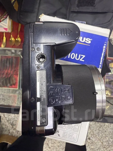 Olympus SP-810UZ. 20 � ����� ��, ���: 14� � ����� ����