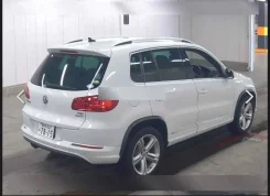 Volkswagen Tiguan. WVGZZZ5NZEW062948 ����