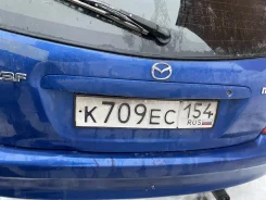 Mazda 323F ����