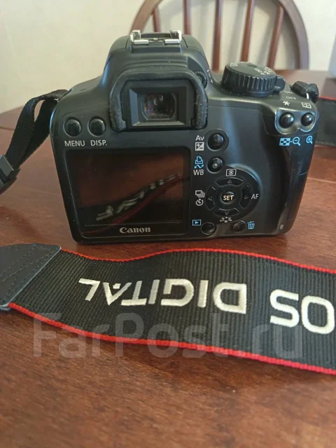 Canon EOS 1000D Kit. 10 - 14.9 �� ����